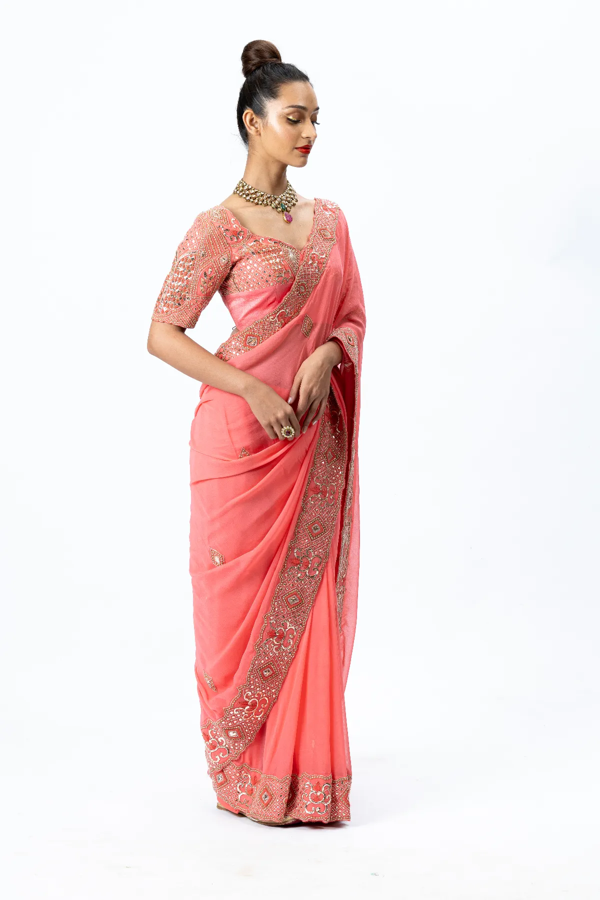 Coral Hand-embroidered Sari paired with Hand-embroidered Blouse and Petticoat