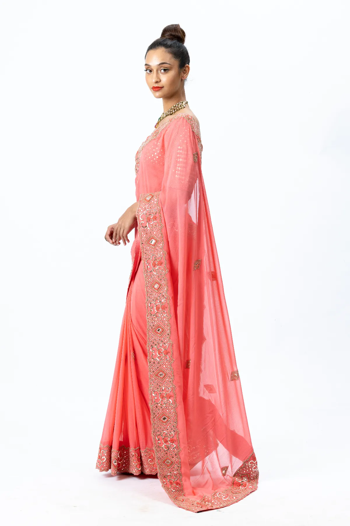 Coral Hand-embroidered Sari paired with Hand-embroidered Blouse and Petticoat